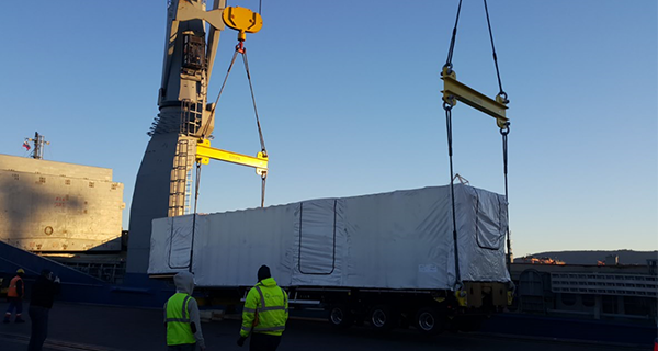 truck trailer being lifted on a container vessel